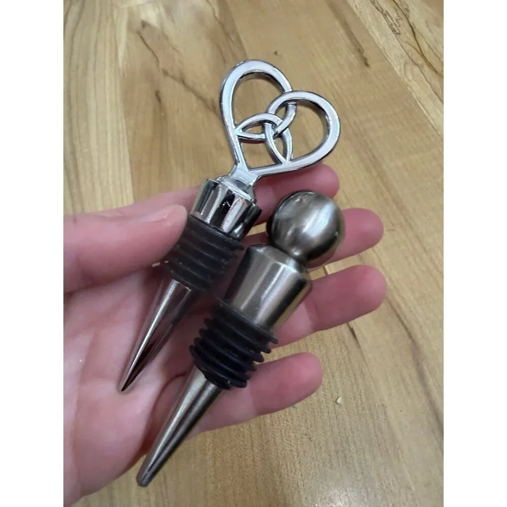 Two piece metal wine stoppers